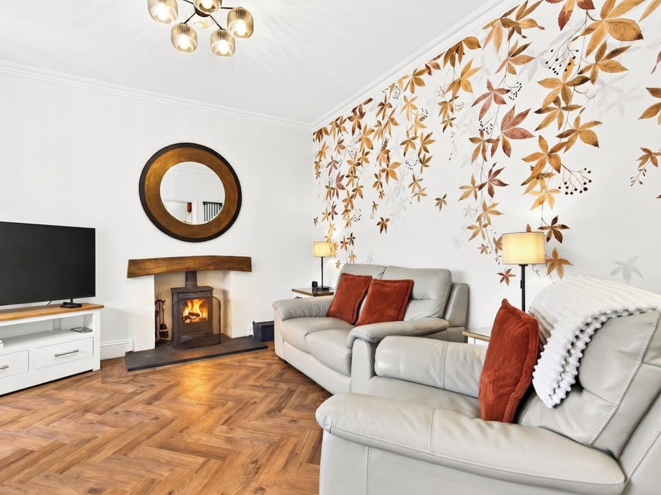 Stylish lounge with wood-burner | Holborn House, Bowness on Windermere