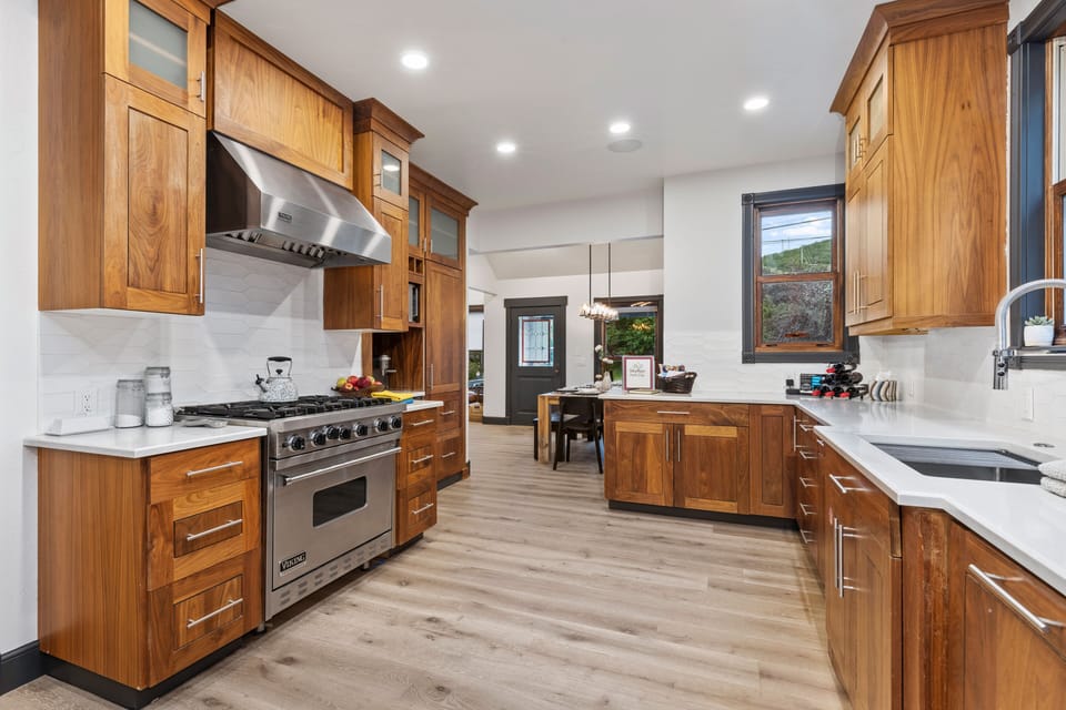 Whip up a gourmet meal in the chef's kitchen featuring high-end appliances, granite countertops, and a full range of cooking essentials for your Park City getaway.