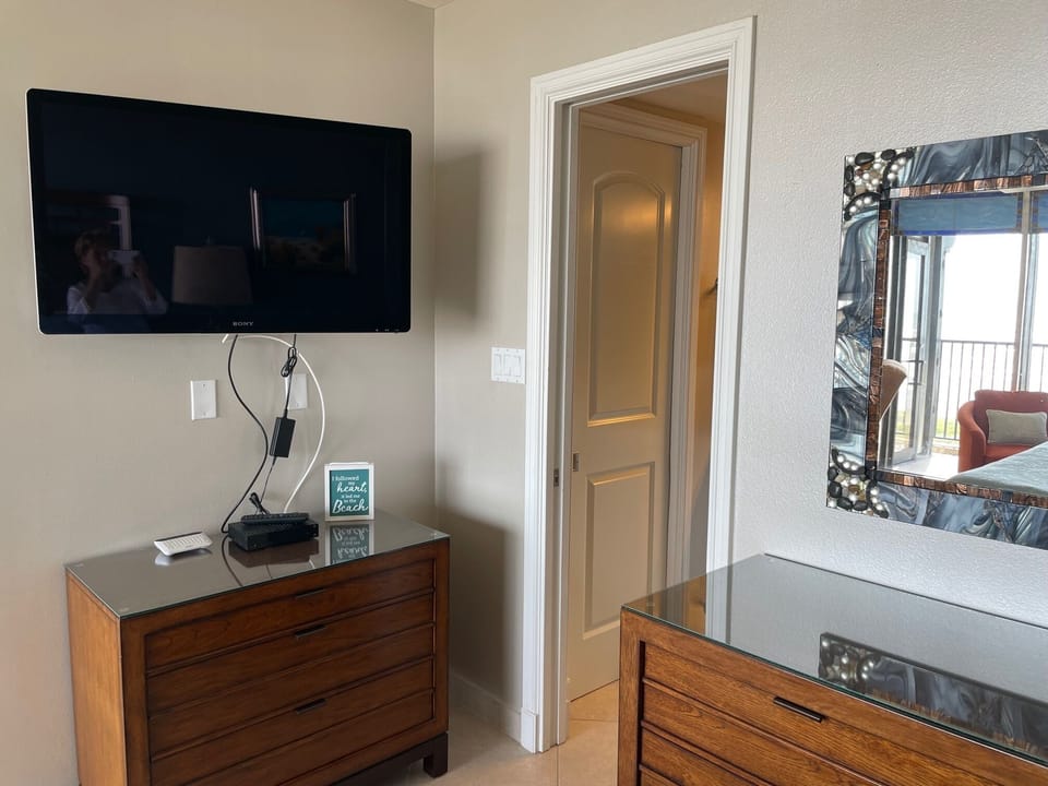 The Master Suite has a large TV and 2 dressers.