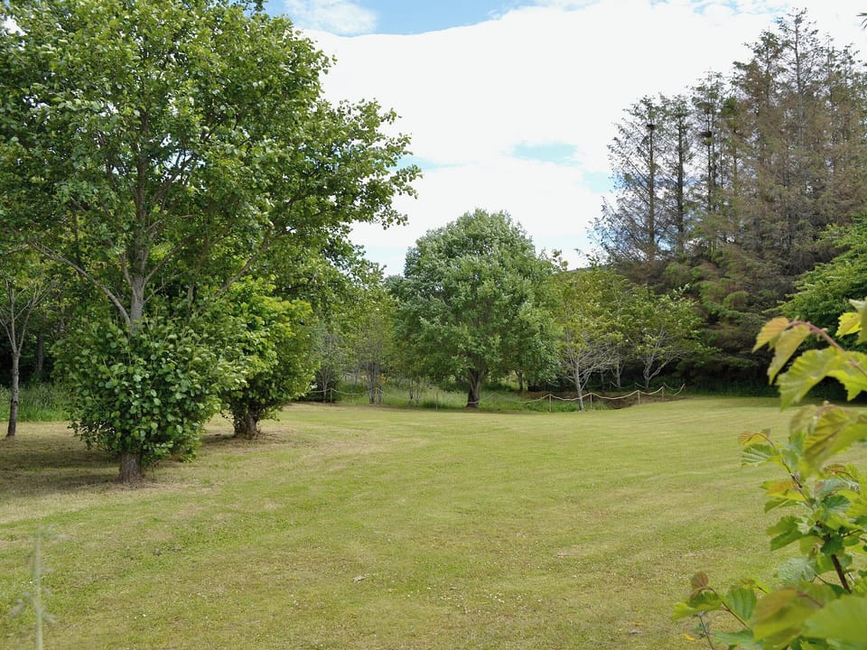 Large lawned areas | Woodside Cottage, Nether Bellandy, Glenrinnes, near Keith