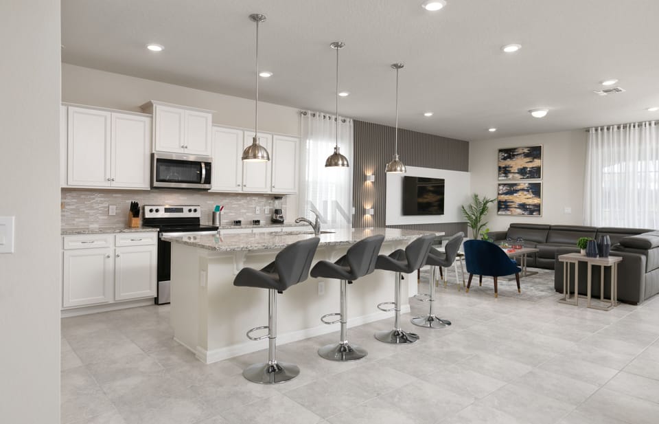 The open kitchen, connected to the living room, keeps everyone together.