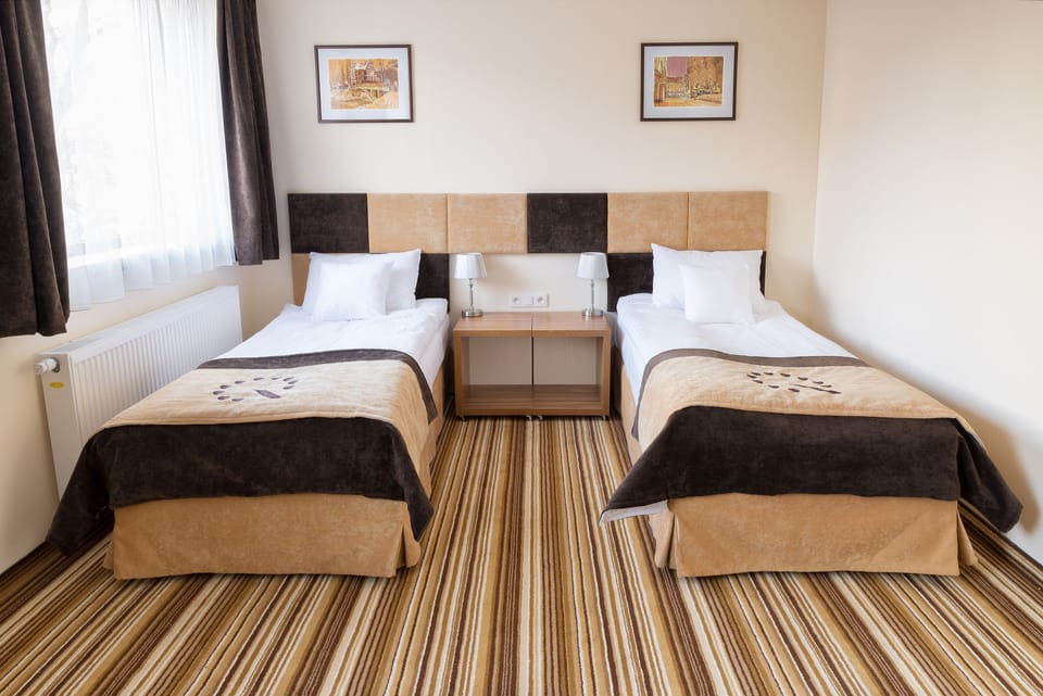 Twin Room | Premium bedding, desk, laptop workspace, blackout drapes