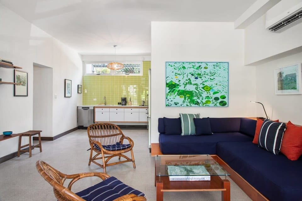 Living room alongside the modern kitchen 