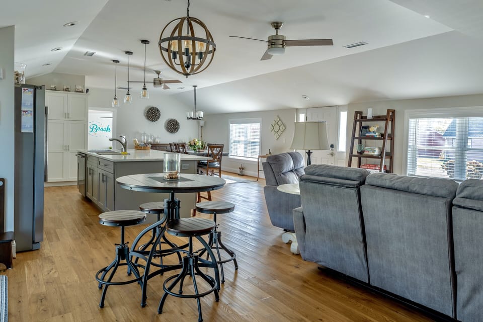 Enter into the open floor plan with updated kitchen, living, and family room.