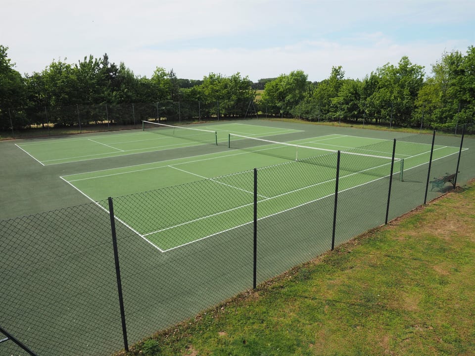 Tennis courts at Cranmer Country Cottages