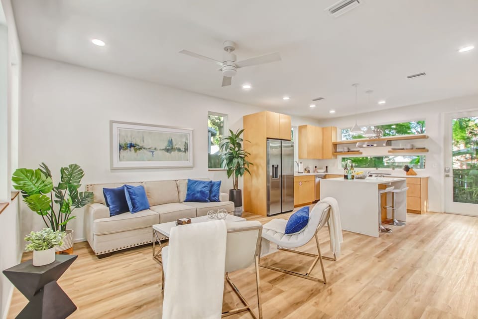 Modern living room with natural light and Smart TV