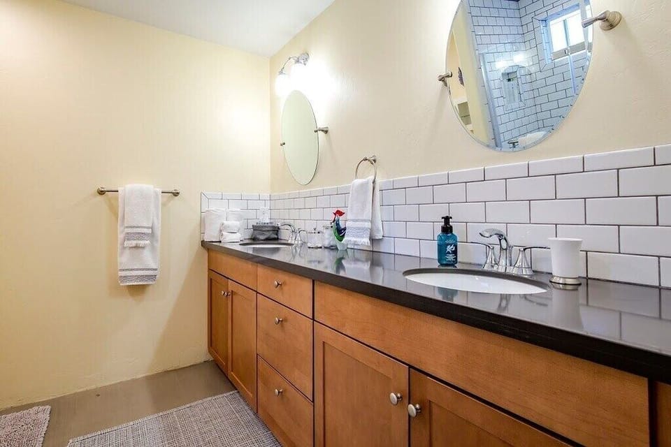 Dual sinks, marble countertops.