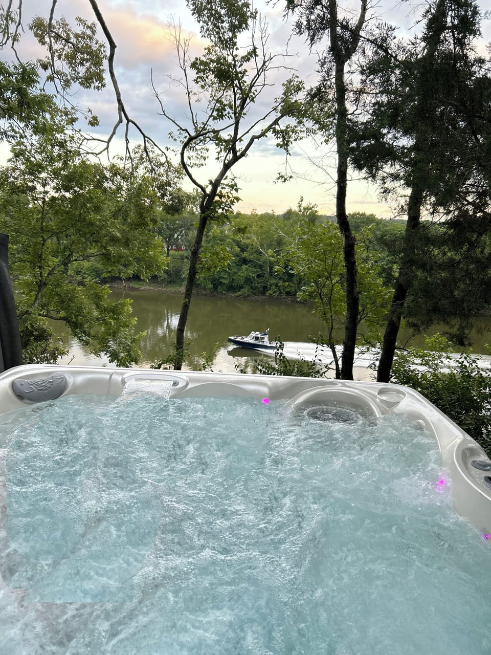 Relax in the hot tub and enjoy the river views!