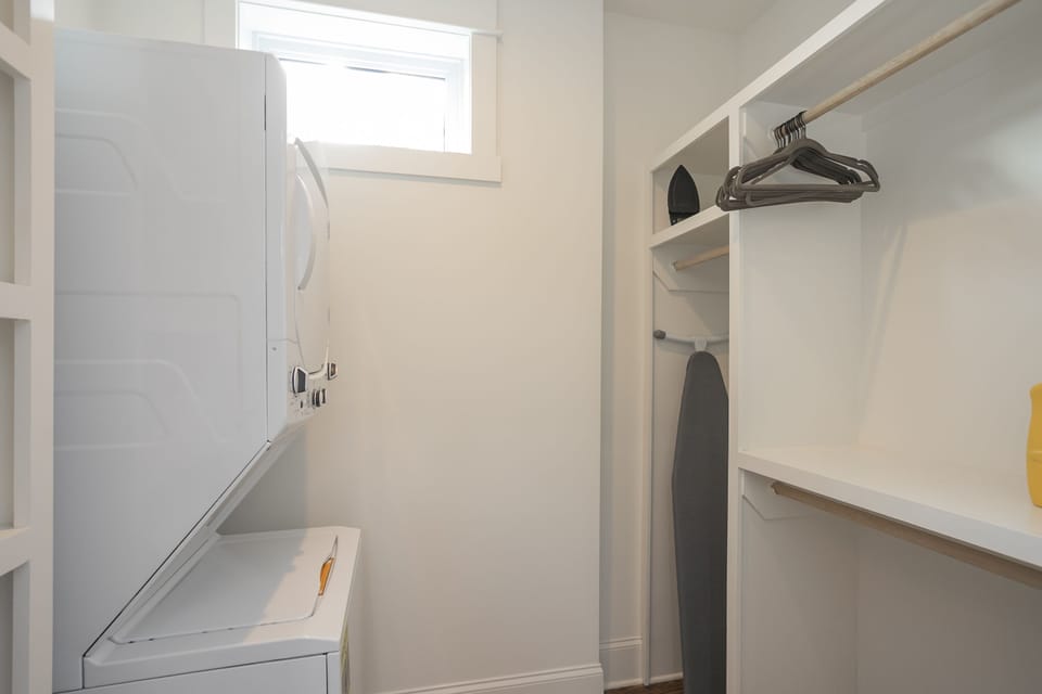 Washer and dryer in back area of master bathroom! We have detergent!