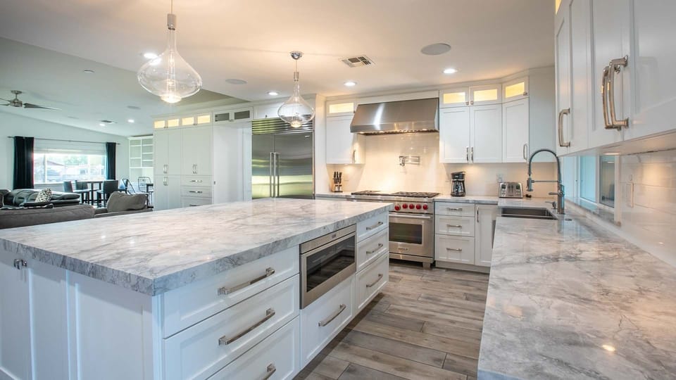 Gorgeous, large kitchen w/high-end appliances off the back patio & living room
