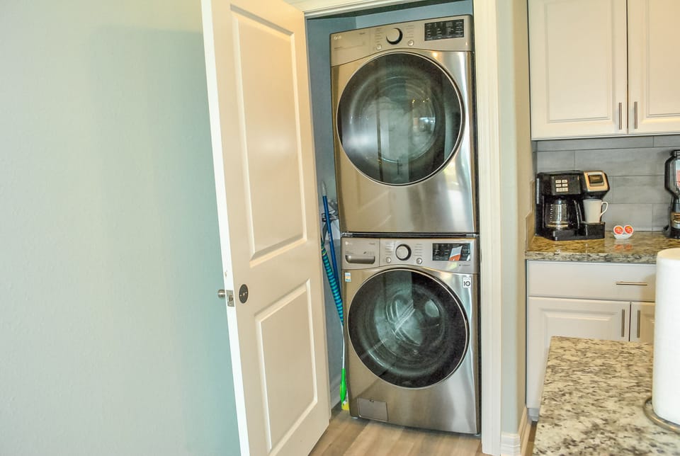Full size washer and dryer. Starter pack of  pods and dryer sheets provided.