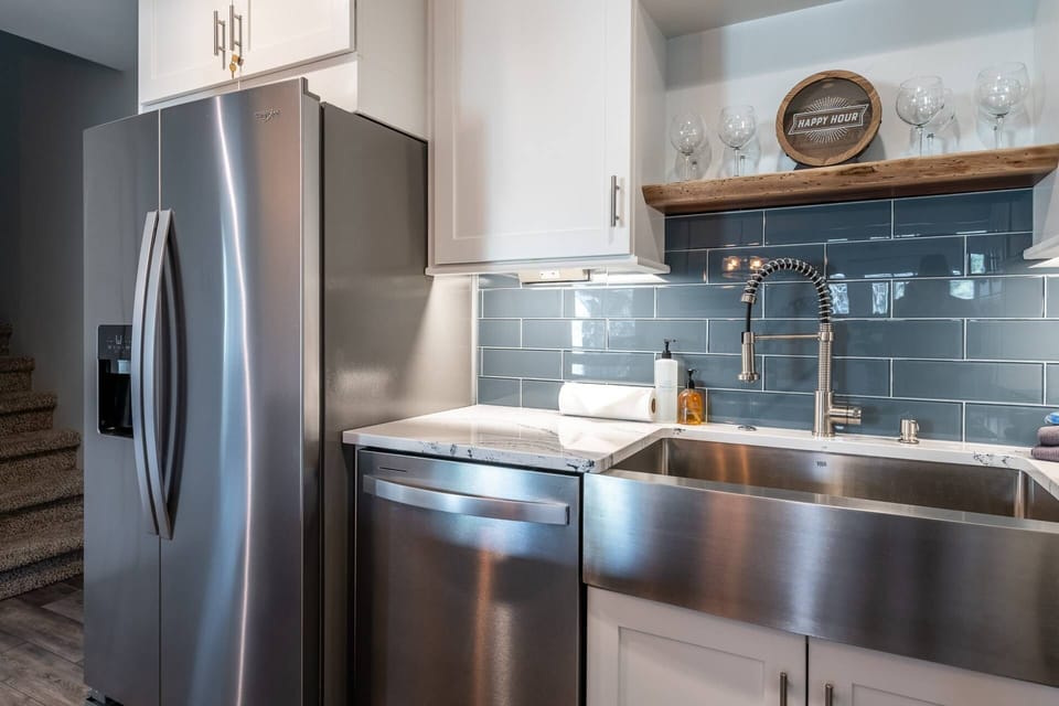 Step into our newly updated kitchen, where modern luxury meets alpine charm.