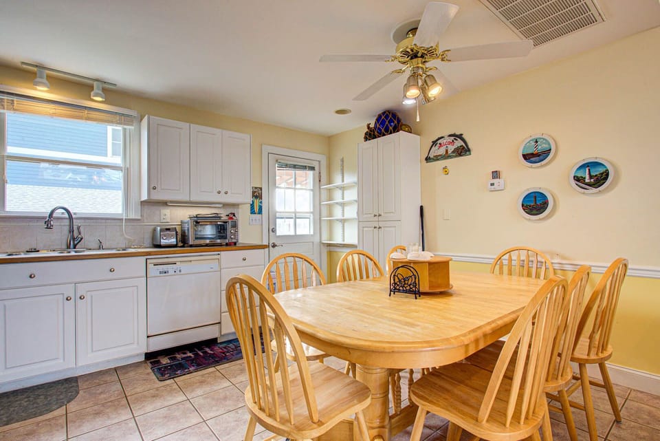 Large dining table with seating for 8, perfect for family meals.