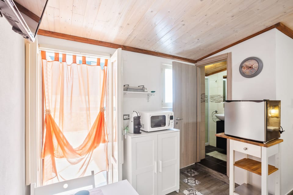 Apartment, 1 Bedroom | Private kitchen | Mini-fridge, microwave, espresso maker, cookware/dishes/utensils