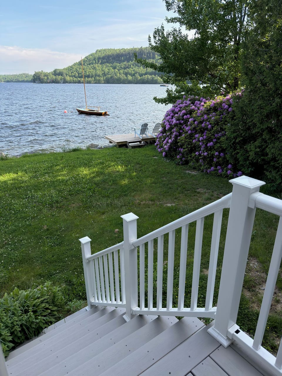 Gentle staircase leading from the main suite down to the lawn and shore
