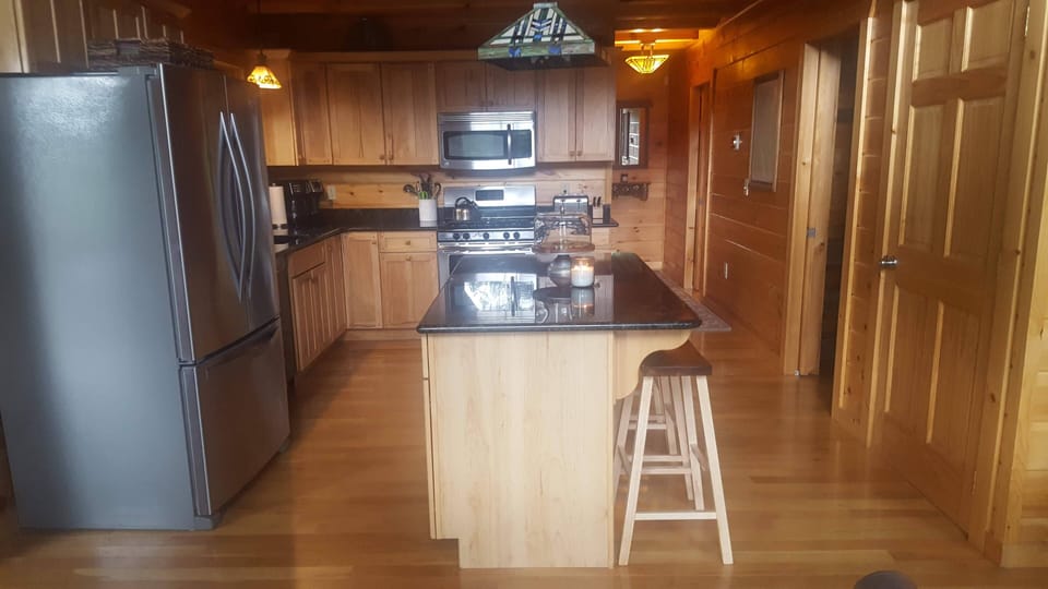 Equipped Kitchen with Island seating for 3