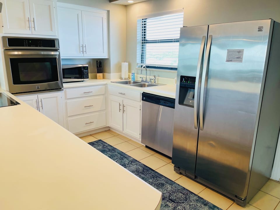 Stainless steel side by side fridge - ample storage space