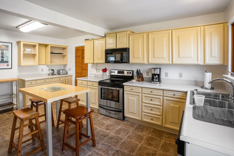 Seat four guests at the kitchen island for breakfast or coffee.