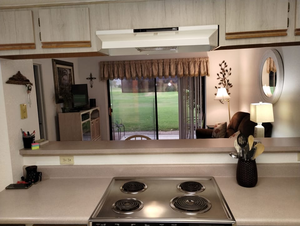 Kitchen with pass thru & Bar