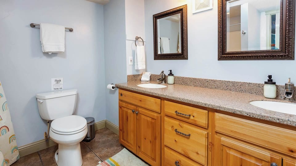 The downstairs also offers a roomy bathroom featuring a double vanity.