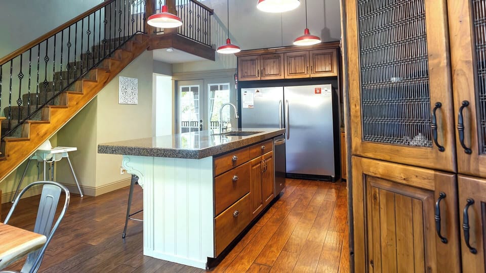 From stainless steel appliances to a hand mixer and baking dishes, our kitchen has everything you need to create delicious home-cooked meals.