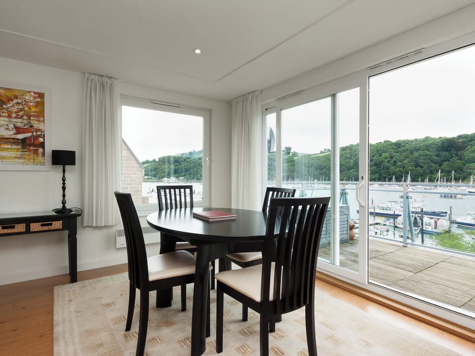 Inviting dining area with stunning views | The Penthouse, Dartmouth