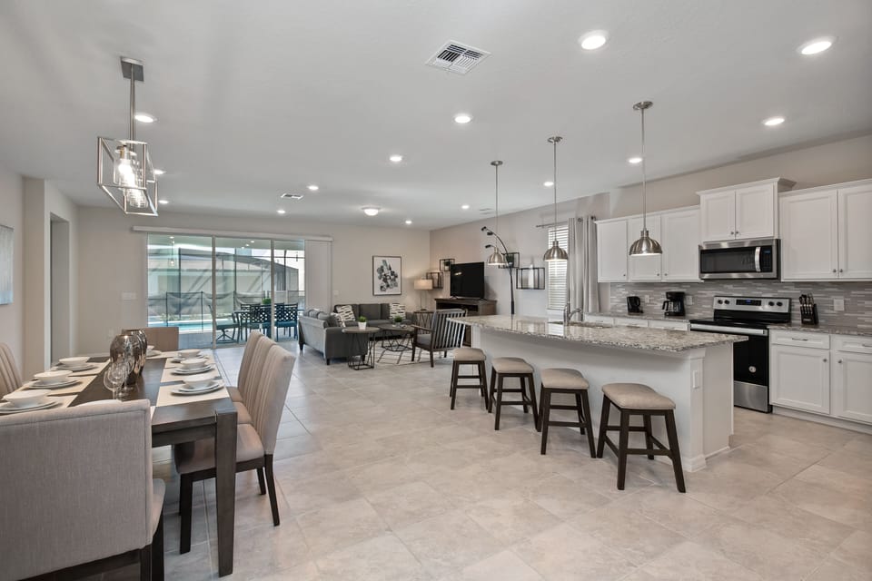 Gorgeous view of large kitchen and dining area