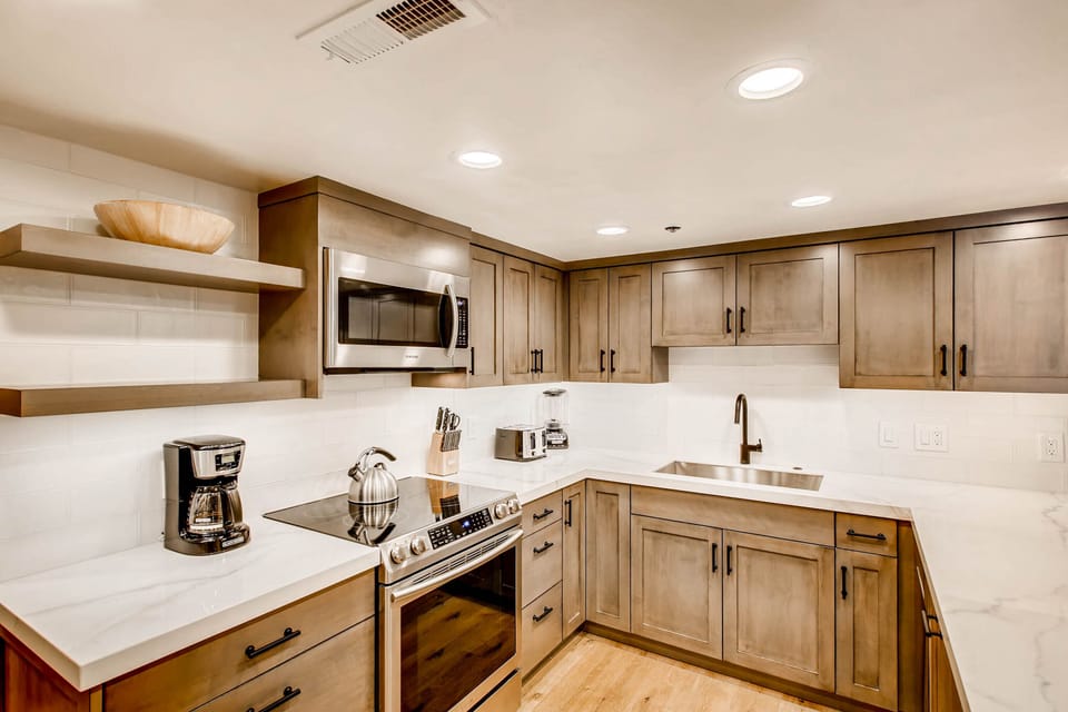 Updated fully equipped kitchen over the range microwave, stainless steel appliances