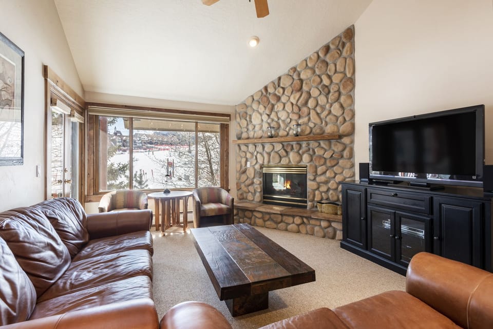 River rock fireplace in the living room