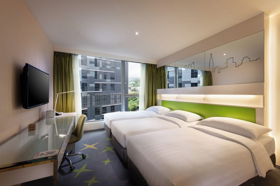 Deluxe Triple Room | In-room safe, desk, blackout drapes, iron/ironing board