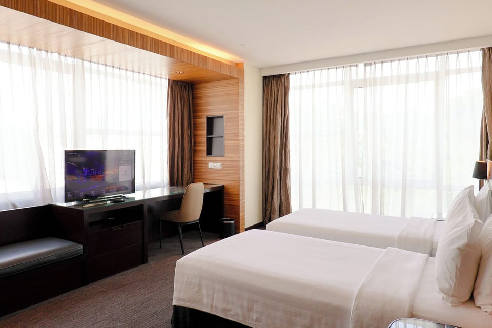 Deluxe Room, 2 Twin Beds | In-room safe, desk, laptop workspace, blackout drapes