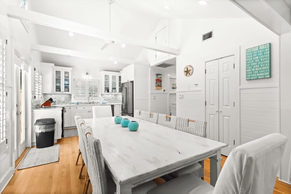 Dining area and full kitchen featured