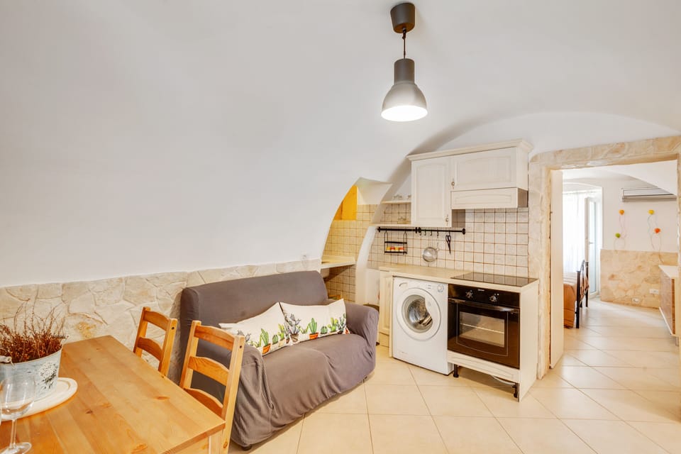 Apartment | Private kitchen | Full-size fridge, oven, stovetop, cookware/dishes/utensils