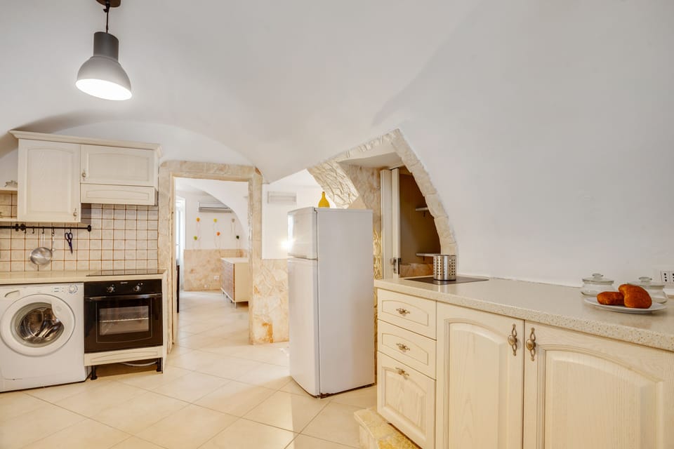 Apartment | Private kitchen | Full-size fridge, oven, stovetop, cookware/dishes/utensils