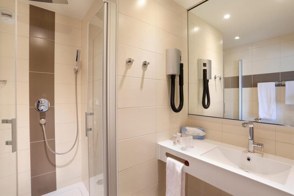 Shower, free toiletries, hair dryer, towels