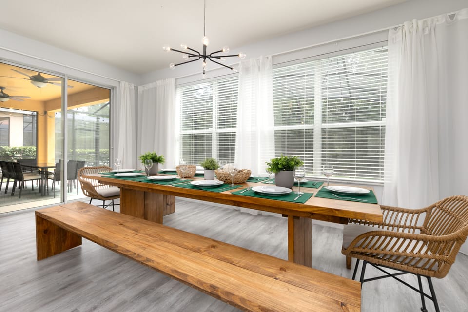 Large Wooden Table with a Stunning Pool View - Perfect for Memorable Meals!