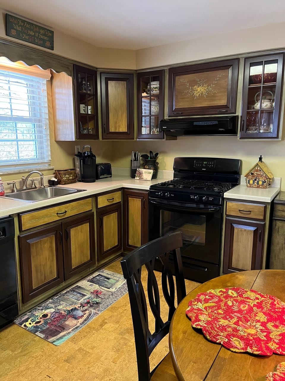 Well stocked kitchen with gas range, microwave, coffee maker, blender, etc.