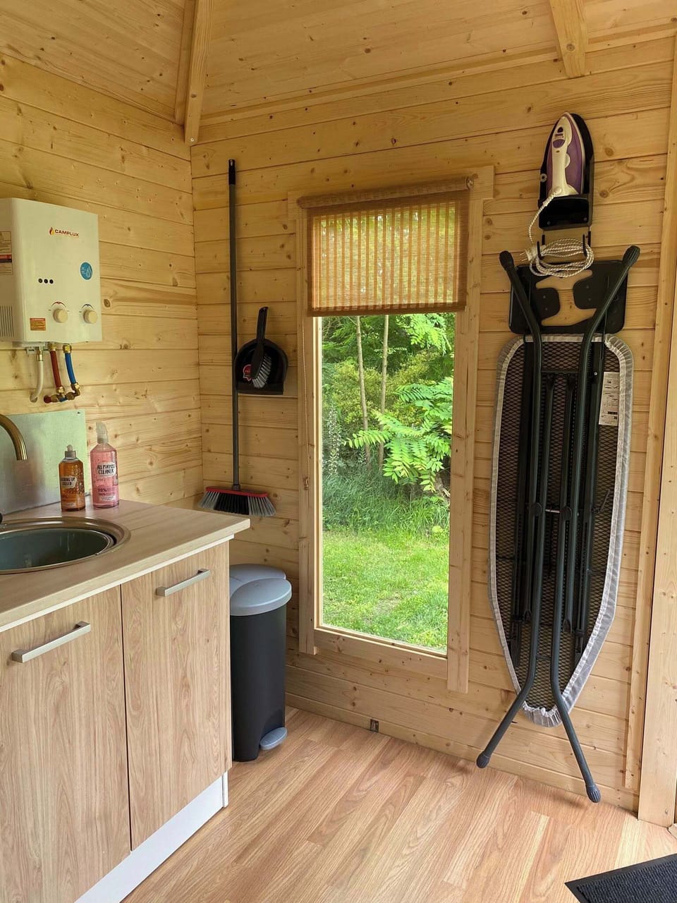 Communal ironing station and recycling area