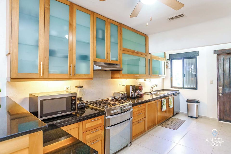 A large kitchen w/ granite countertops, quality appliances & a 6-burner stove!