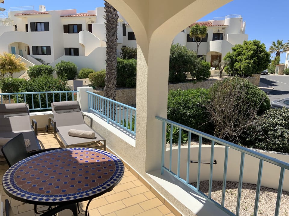 Good size balcony with table and sun loungers