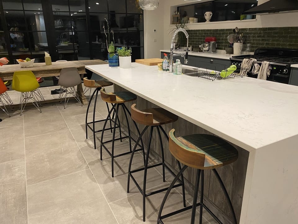 4 barstools and island