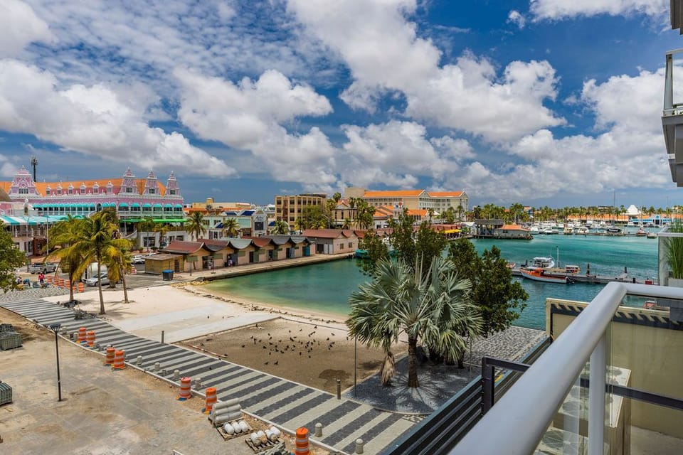 Coastal town with colorful architecture, turquoise harbor waters, and palm-lined streets near the property. A vibrant Caribbean setting with nearby beaches and marina access.