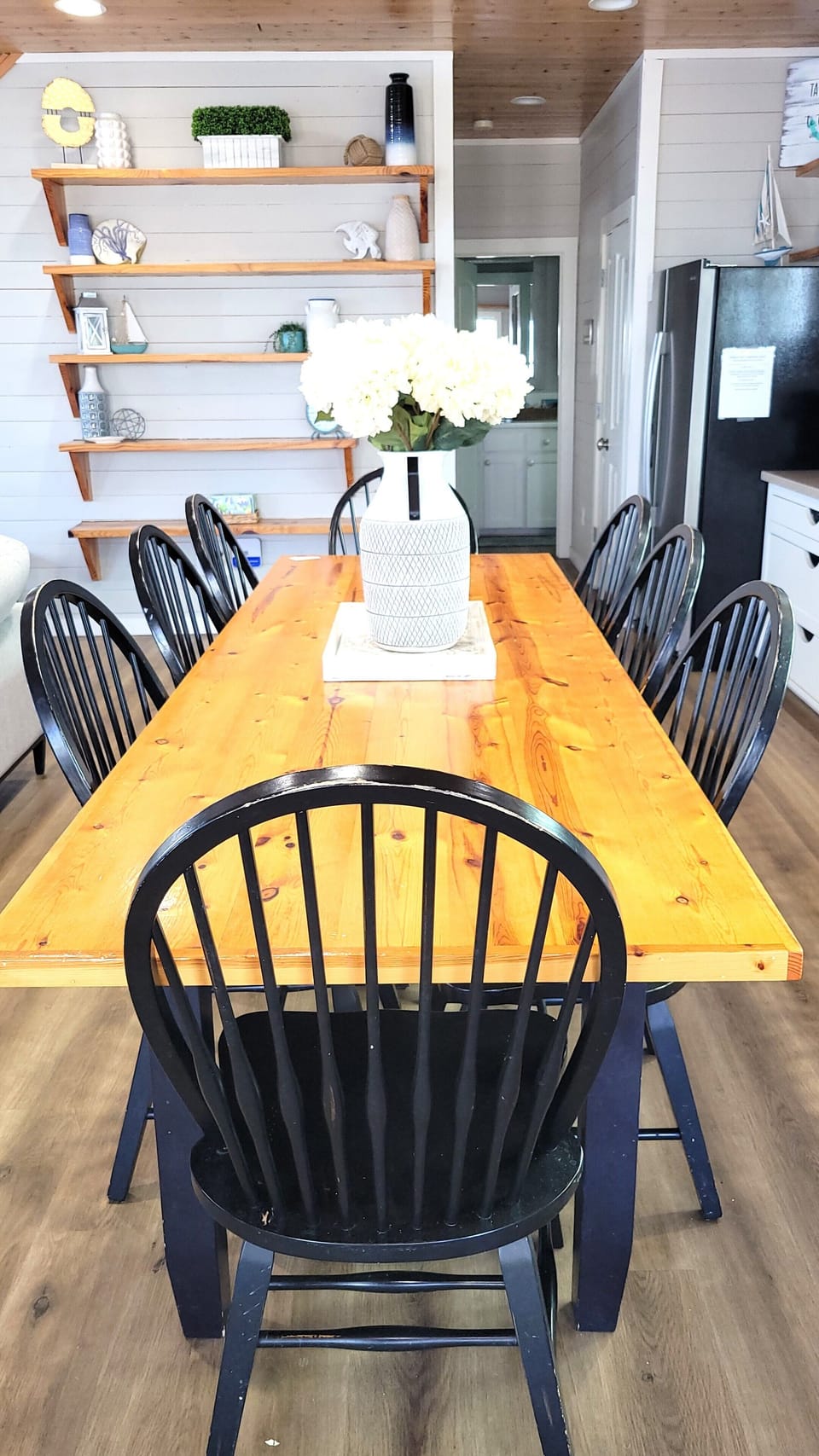 The dining area is next to the kitchen and seats eight guests.