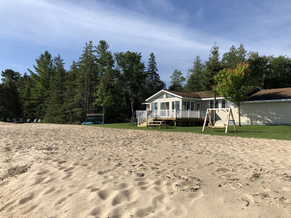240 feet of private sandy Lake Huron beach.