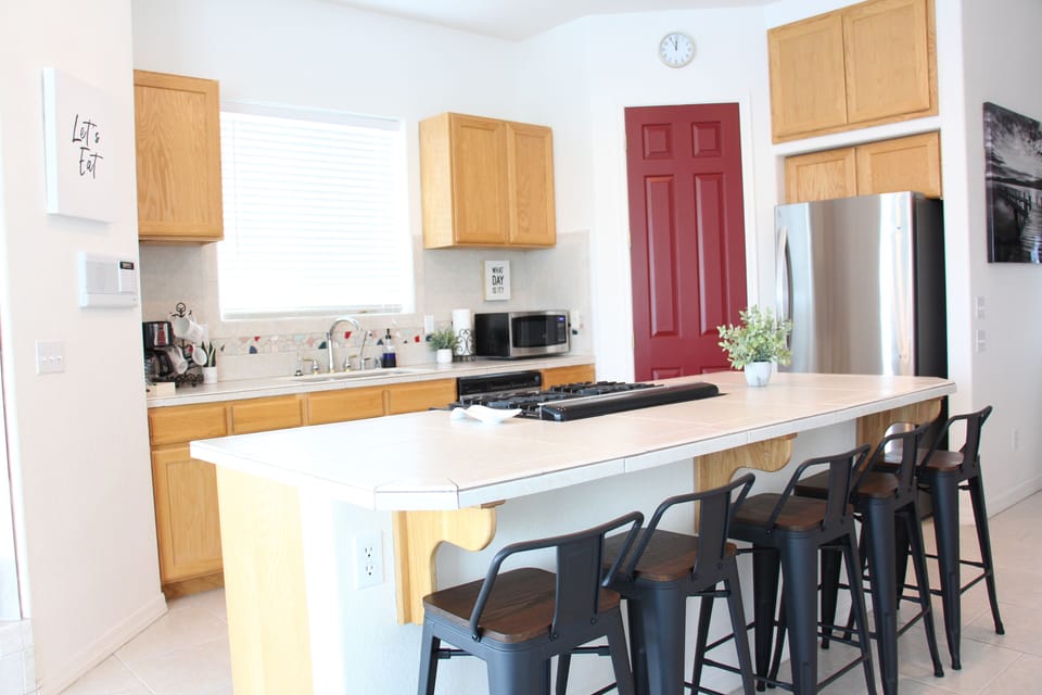 Upper Level Kitchen with New Refrigerator and Walk In Pantry
