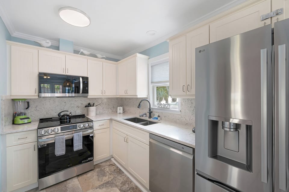 Fully equipped kitchen with new stainless appliances