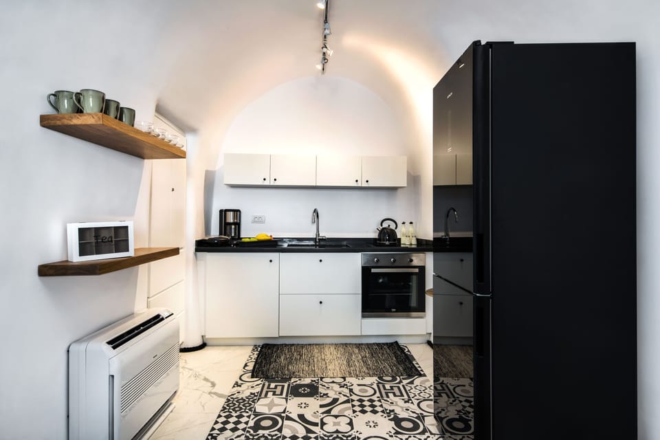 Villa | Private kitchen | Fridge, microwave, oven, stovetop