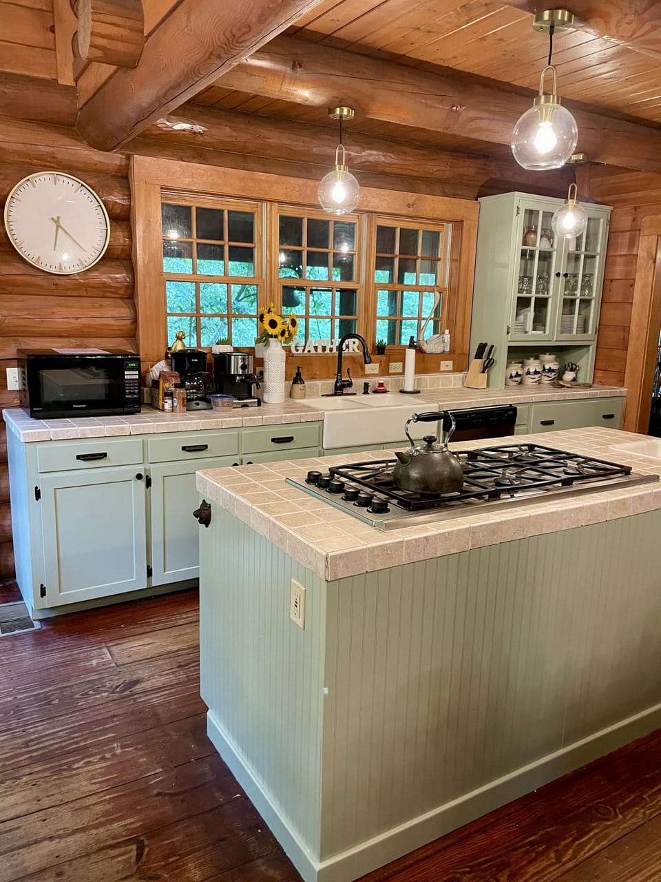 Chef's kitchen with 6 burner gas stove and double ovens.