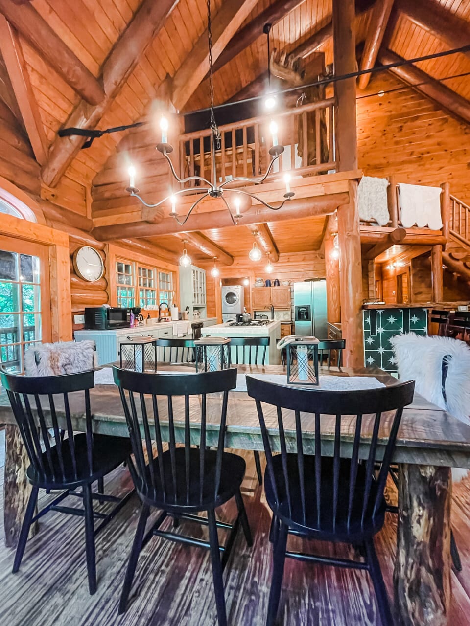 Hand crafted dining room table with seating for 8 and 4 more seats at the bar.