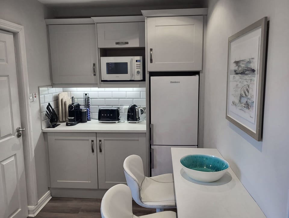 Seamlessly serve from oven to table in our eat-in kitchen.